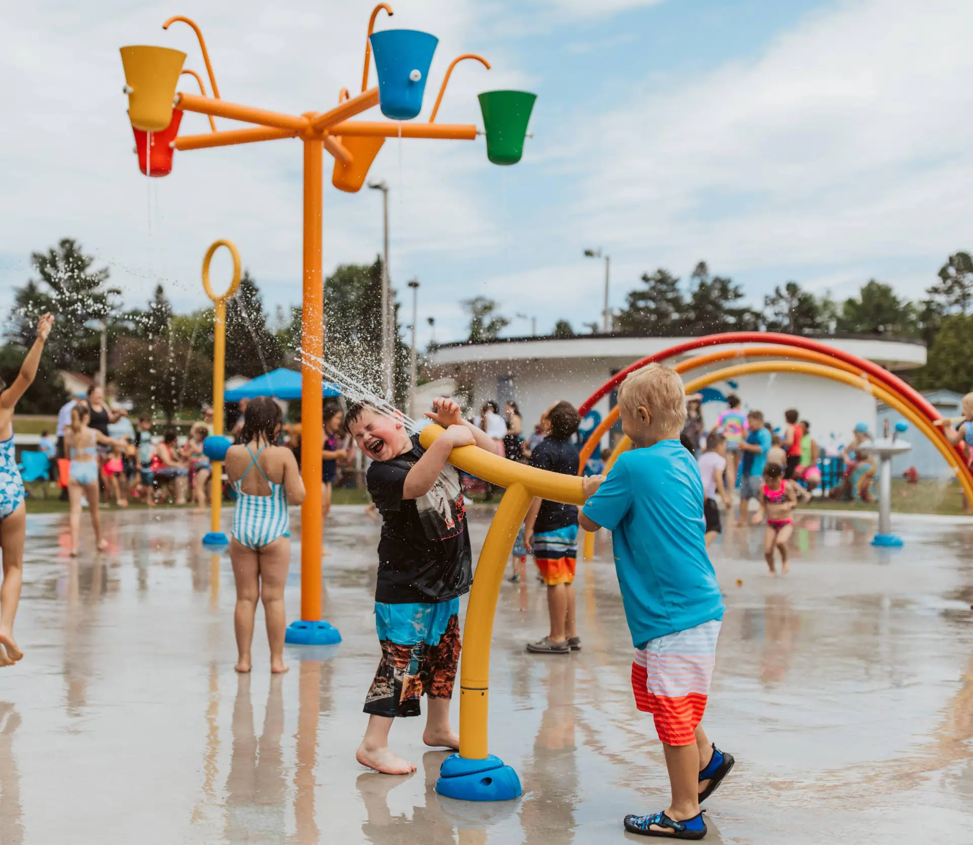 Water features at Aurora Splash Pad in Pine Grove Park.