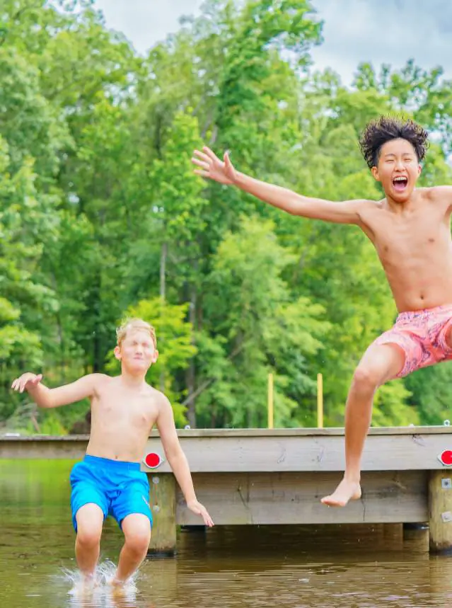 Kids enjoying an outdoor water play area in the Shreveport-Bossier region.