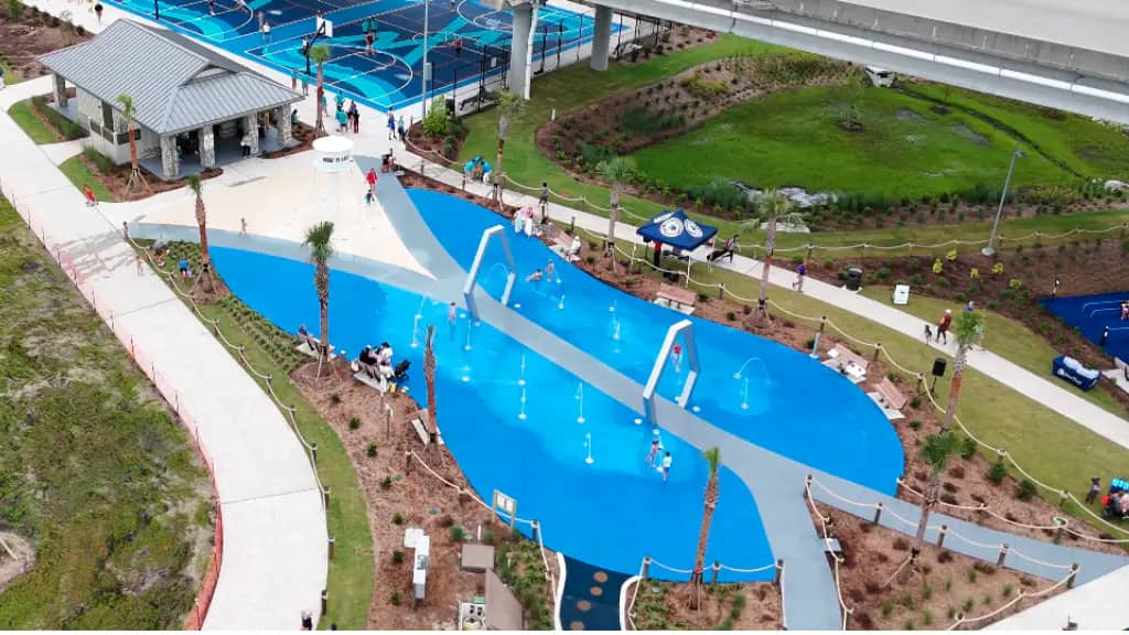 Mount Pleasant Splash Pad at Memorial Waterfront Park with colorful spray features and bridge-themed design.