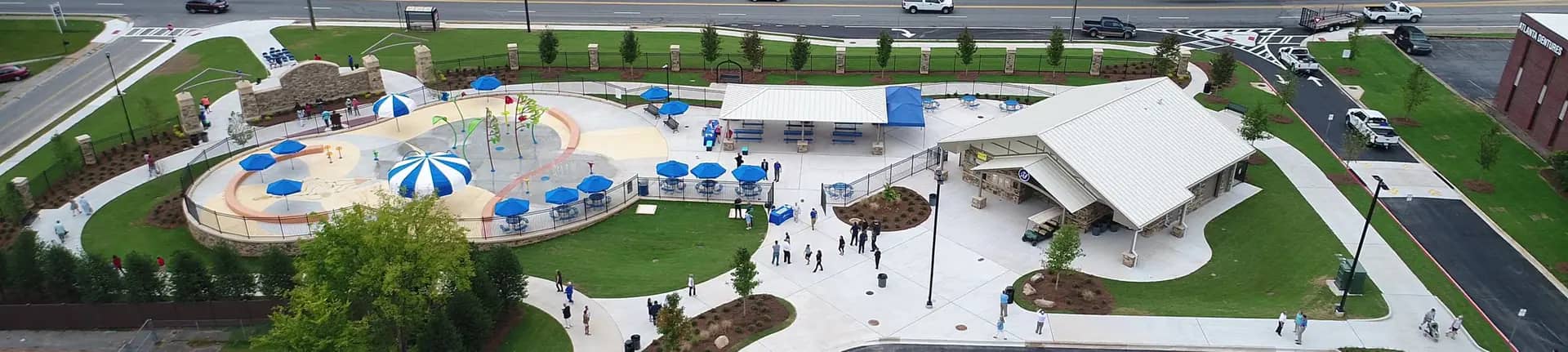 Splash pad area and adjacent building at Elizabeth Porter Sprayground.