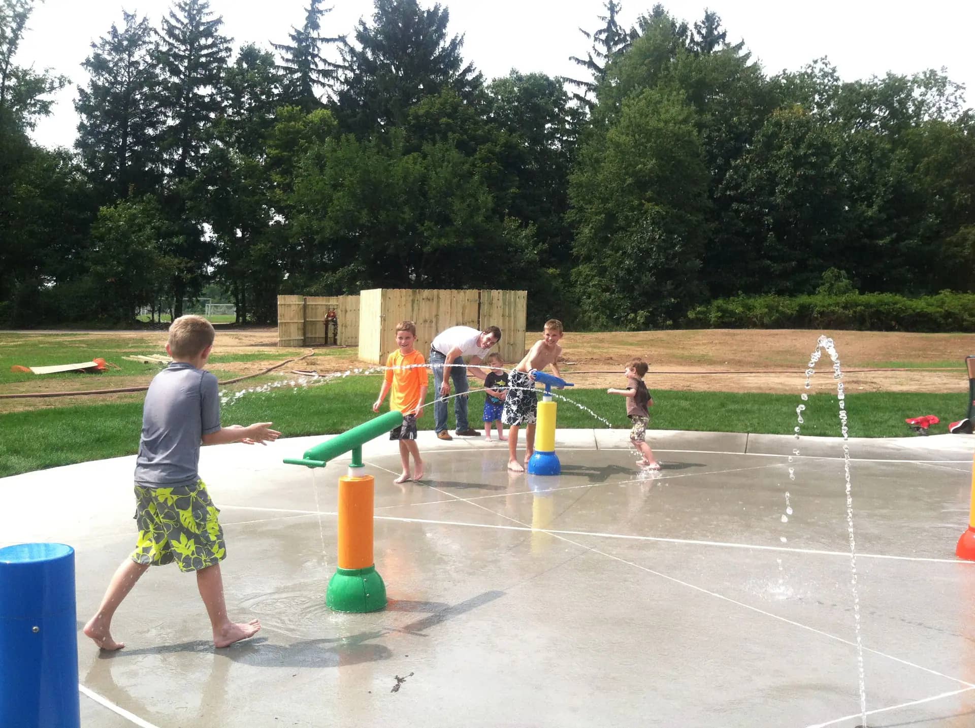 Children playing at River Oaks Splash Pad in Galesburg.