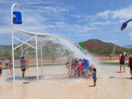 Kids enjoying the Warden Family Splash Pad in Tucson.