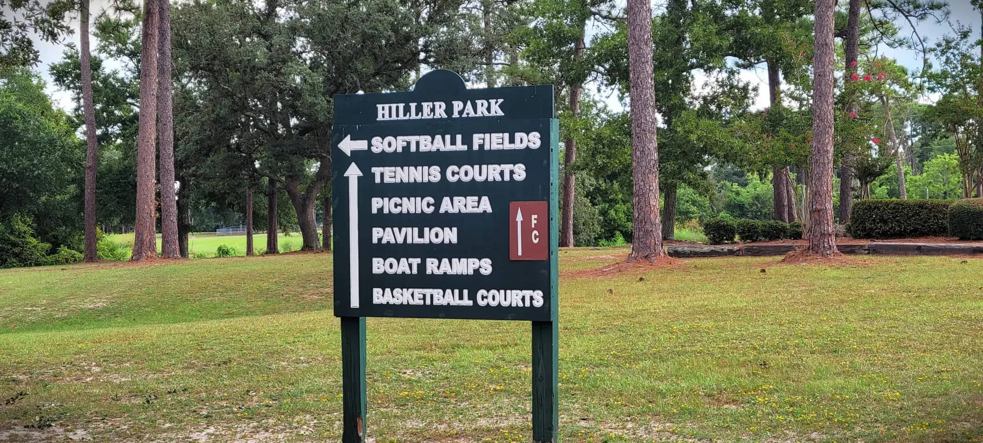 Wide view of Hiller Park in Biloxi, home to a seasonal splash pad and large family park amenities.