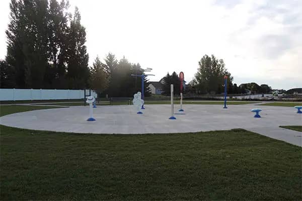Children playing in the spray features at Choice Spray Park in Grand Forks.