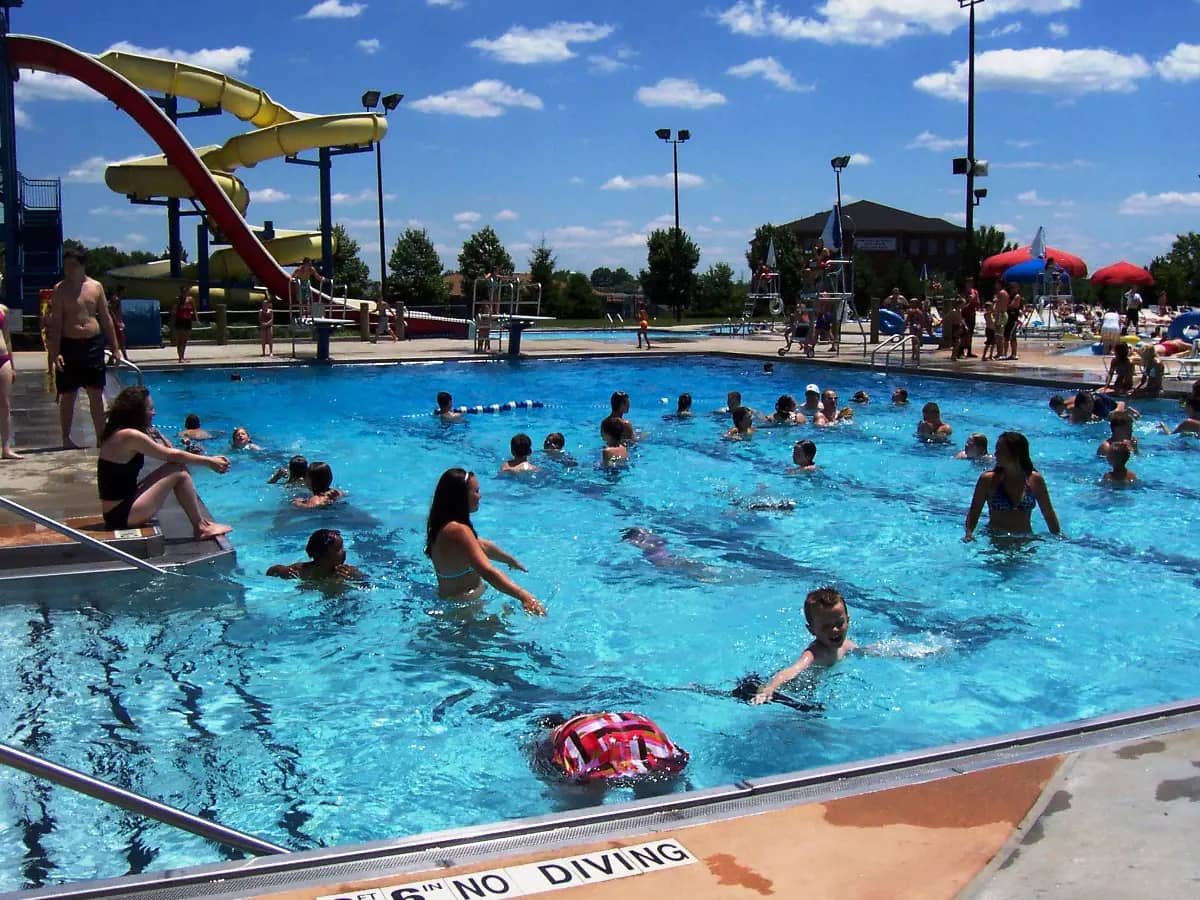 Wide view of Florence Family Aquatic Center with pools, deck space, and family water-play areas.