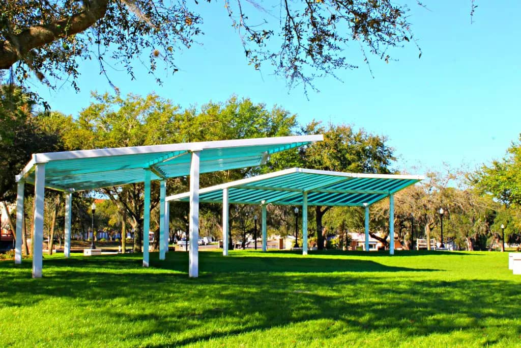 Covered seating near the splash pad at Sims Park.