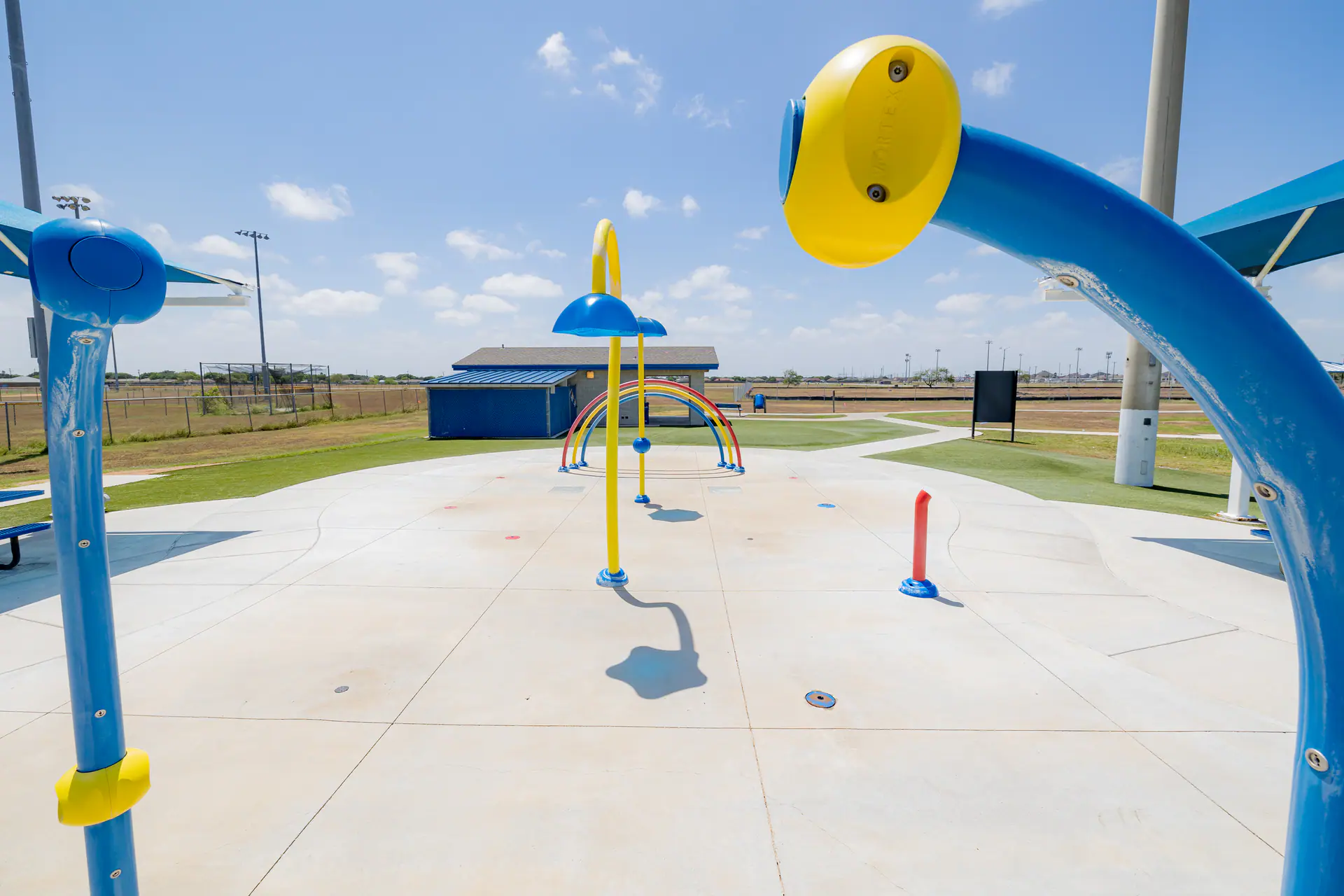 Bill Witt Park Splash Pad in Corpus Christi with water features and open play space.
