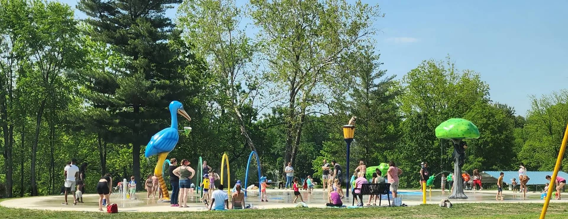 Children playing at Belleville Splash Pad in Bicentennial Park.