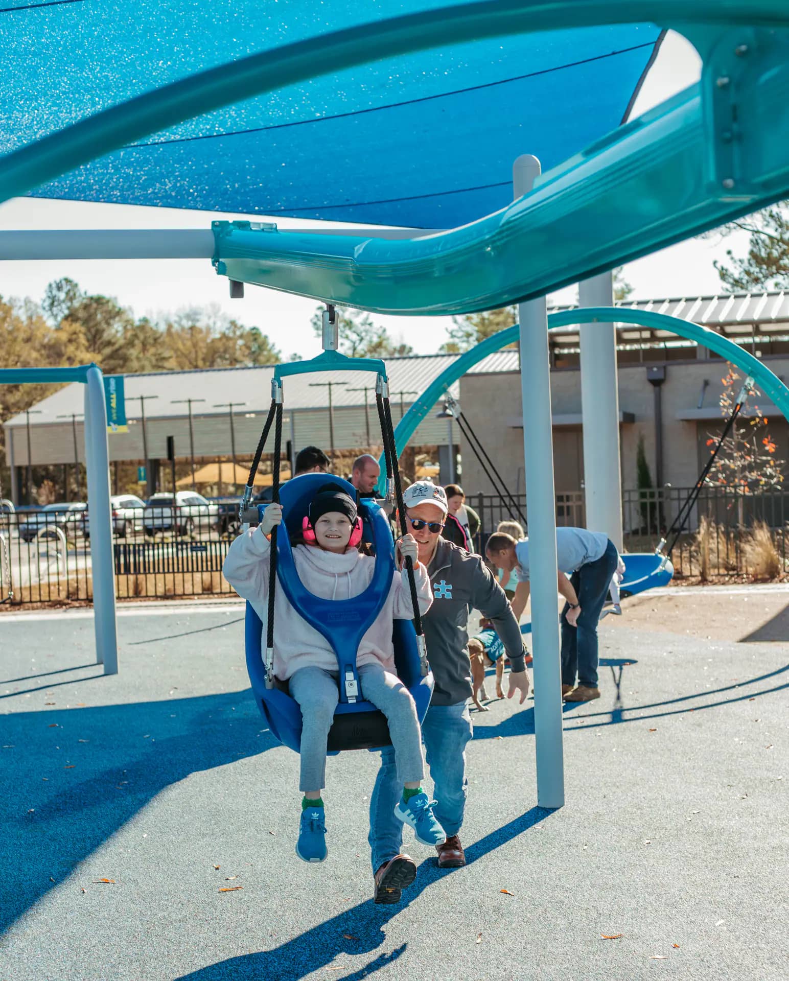 Park feature area with shade structures at Central Creek Park.