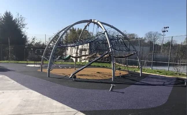 Updated play equipment and safety surface at Granahan Playground, where a new sprayground was also added.